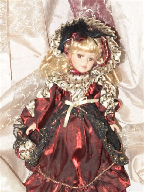 GermanAustrian folk dolly. . Genuine fine bisque porcelain doll